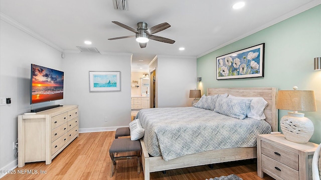 bedroom featuring light wood-style flooring, baseboards, visible vents, and ornamental molding