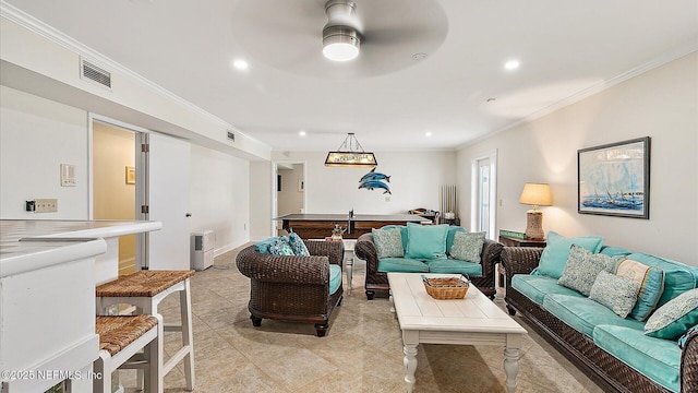 living area featuring visible vents, recessed lighting, ceiling fan, and ornamental molding