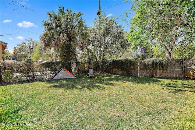 view of yard featuring fence