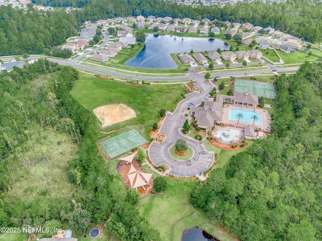 aerial view featuring a residential view and a water view