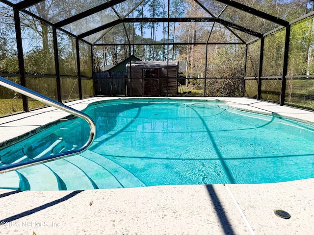 outdoor pool with glass enclosure, cooling unit, a storage unit, and an outdoor structure