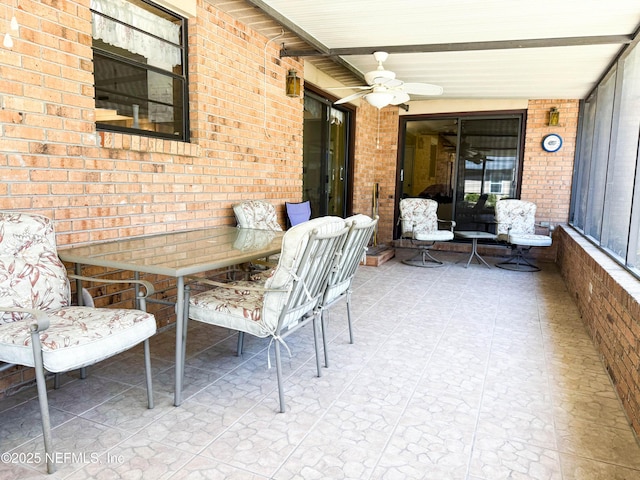 view of patio / terrace featuring ceiling fan