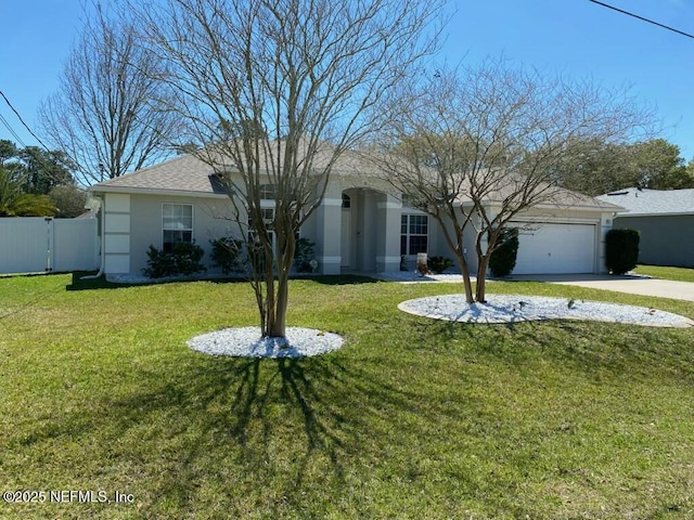 ranch-style home with fence, stucco siding, a front lawn, concrete driveway, and a garage