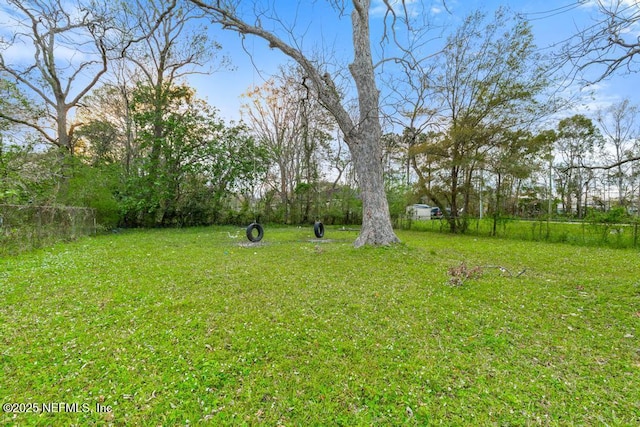 view of yard with fence