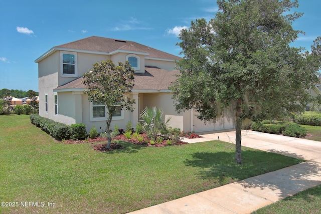 mediterranean / spanish home with stucco siding, roof with shingles, concrete driveway, a front yard, and a garage