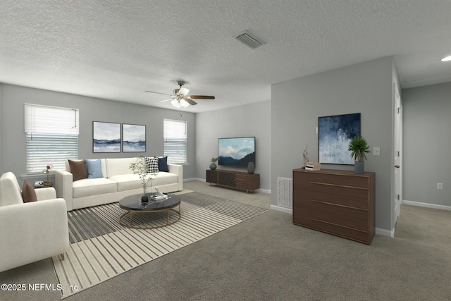 living area with carpet, a ceiling fan, visible vents, and baseboards