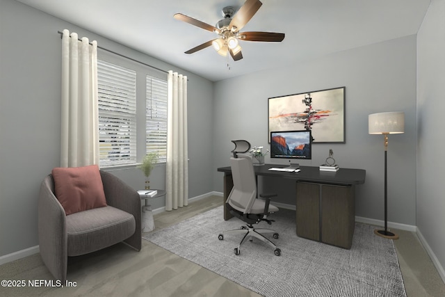 office area with baseboards and ceiling fan