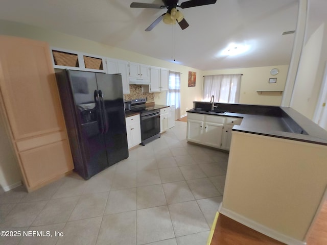 kitchen with electric stove, a sink, dark countertops, white cabinets, and black refrigerator with ice dispenser