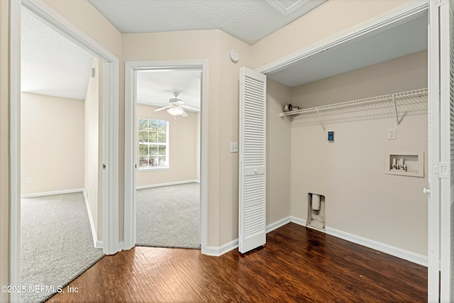 laundry room featuring dark wood finished floors, laundry area, hookup for a washing machine, electric dryer hookup, and a ceiling fan