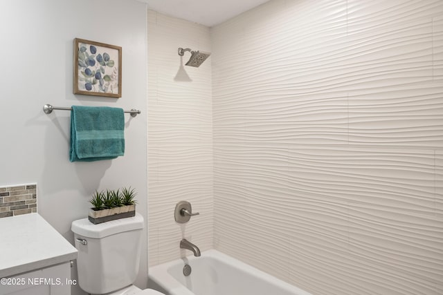 full bathroom featuring toilet, vanity, and  shower combination