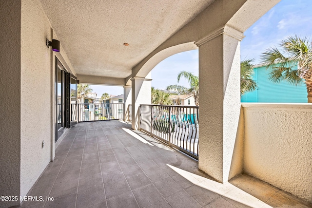 view of patio with a balcony