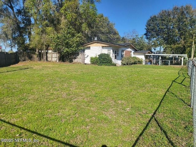 view of yard featuring a fenced backyard