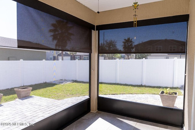 view of unfurnished sunroom