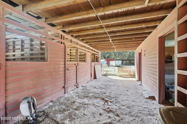 view of patio / terrace with an exterior structure and an outbuilding