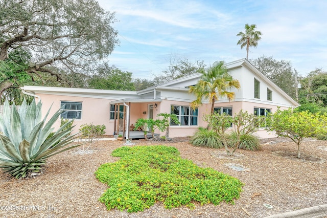 view of front of home featuring stucco siding