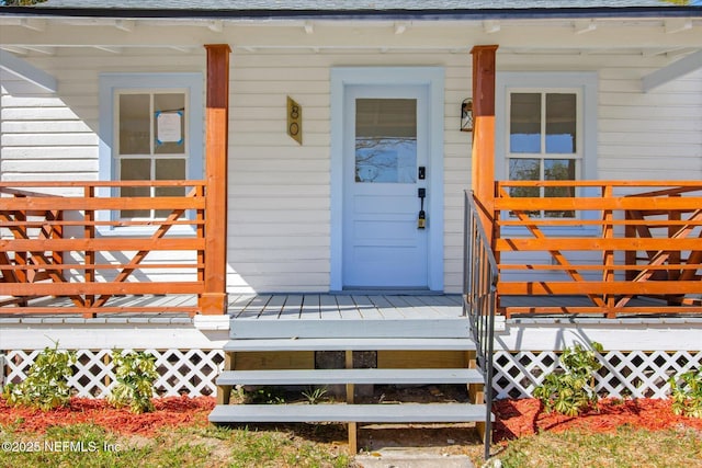 80 Anderson St, Saint Augustine, FL 32084 - entrance to property featuring a porch and roof with shingles