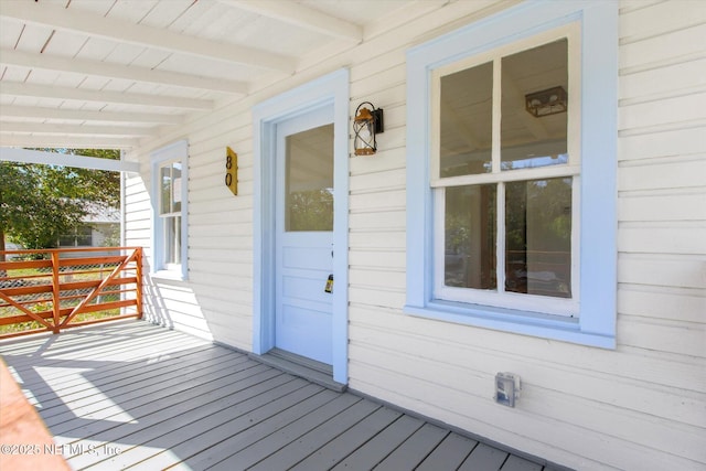 80 Anderson St, Saint Augustine, FL 32084 - wooden deck featuring a porch