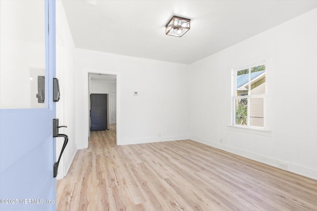 80 Anderson St, Saint Augustine, FL 32084 - empty room featuring light wood-style floors and baseboards
