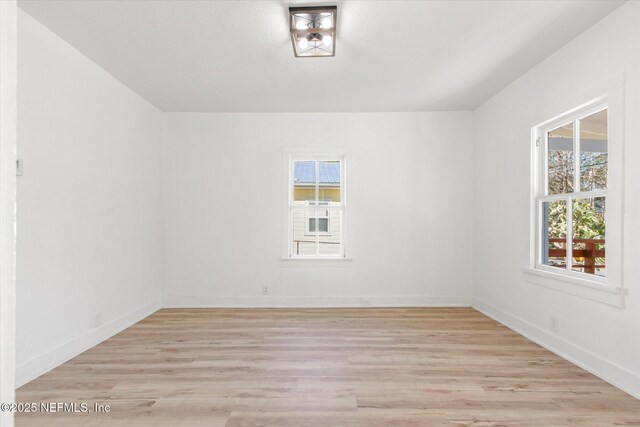 80 Anderson St, Saint Augustine, FL 32084 - empty room featuring baseboards and light wood-type flooring