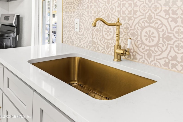 80 Anderson St, Saint Augustine, FL 32084 - interior details featuring light countertops and a sink