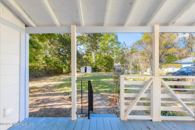 80 Anderson St, Saint Augustine, FL 32084 - wooden terrace with an outdoor structure and fence