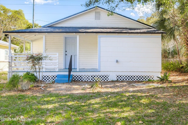 80 Anderson St, Saint Augustine, FL 32084 - view of front of home with a front lawn and fence