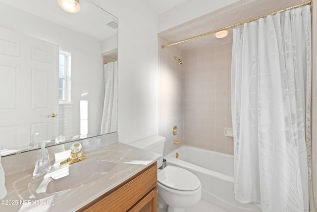 full bath with vanity, toilet, shower / bath combo, and visible vents