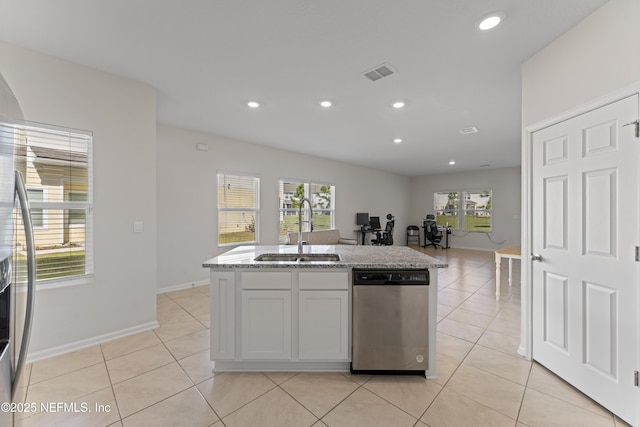 kitchen featuring visible vents, light tile patterned flooring, recessed lighting, a sink, and dishwasher