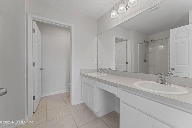 full bathroom featuring tile patterned flooring, toilet, visible vents, and a sink