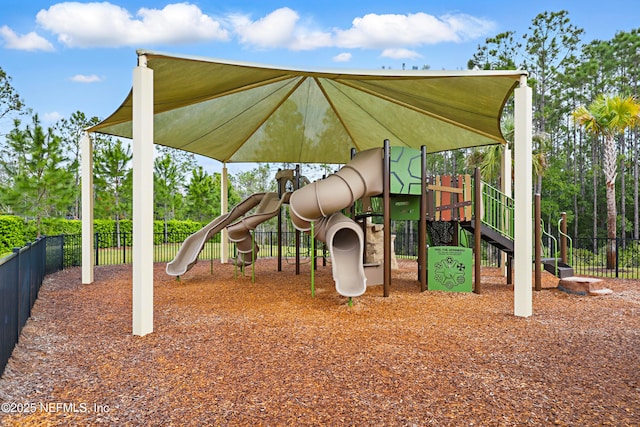 community jungle gym with fence