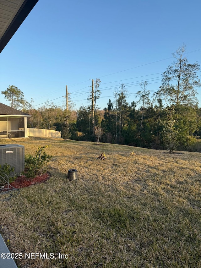 view of yard featuring central AC