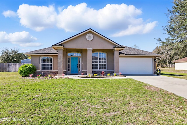 ranch-style home with stucco siding, concrete driveway, a front lawn, and fence