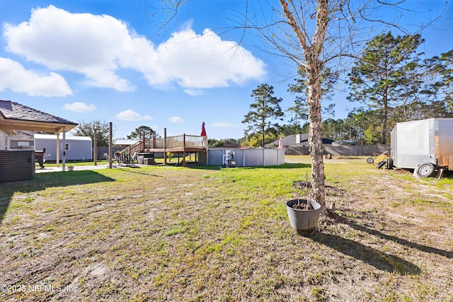 view of yard with a deck