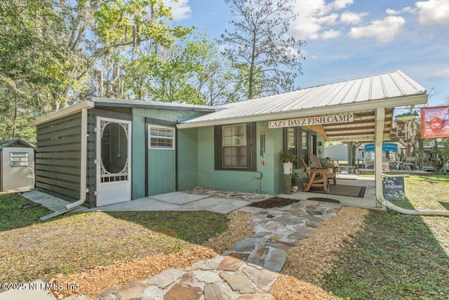 view of front of property with metal roof