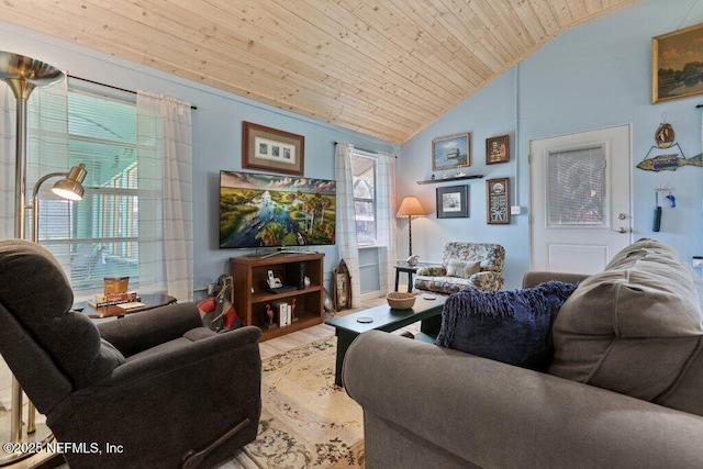 living area with lofted ceiling, wood ceiling, and a wealth of natural light