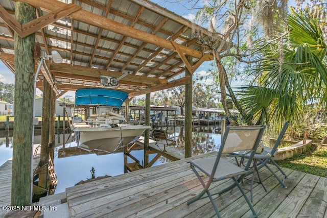 view of dock with a water view and boat lift