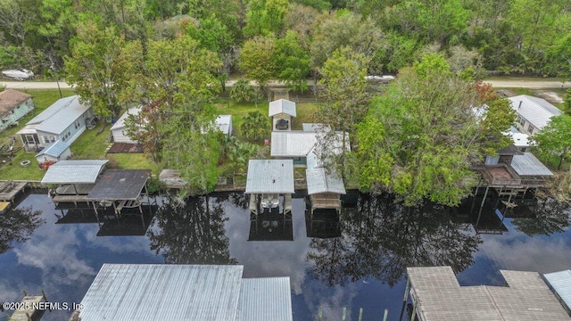 bird's eye view with a residential view and a water view