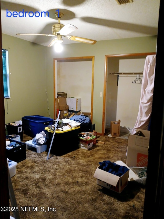 bedroom featuring ceiling fan