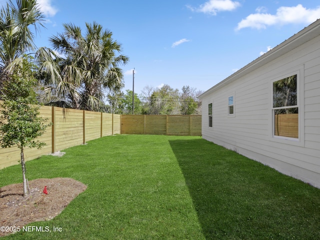 view of yard featuring a fenced backyard