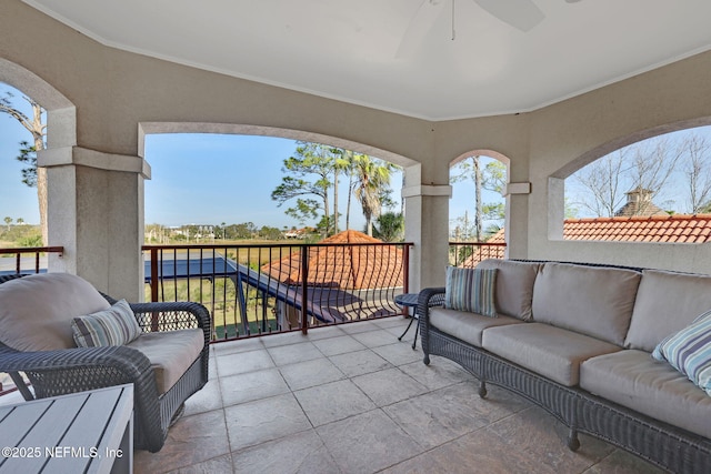 view of patio / terrace with an outdoor living space and a balcony