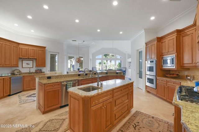 kitchen with light stone countertops, a center island with sink, a sink, appliances with stainless steel finishes, and crown molding