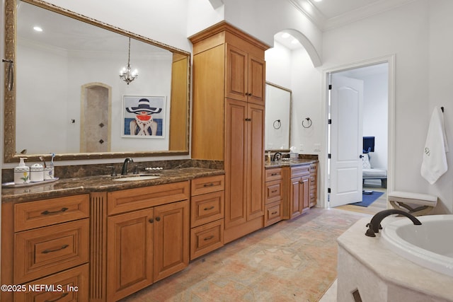 bathroom featuring vanity, crown molding, a tub to relax in, and a shower