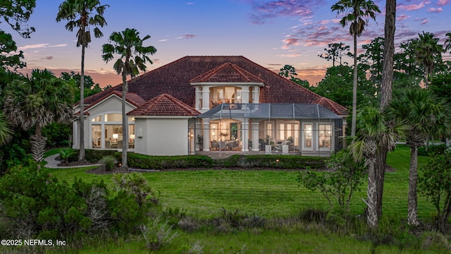 800 Hawks Nest Ct, Ponte Vedra Beach, FL 32082 - view of front of property with a balcony, stucco siding, a yard, and a tile roof