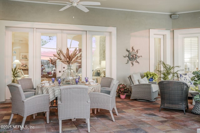 800 Hawks Nest Ct, Ponte Vedra Beach, FL 32082 - dining area featuring a ceiling fan, healthy amount of natural light, stone finish flooring, and ornamental molding