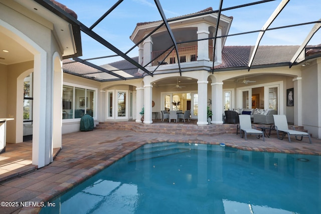800 Hawks Nest Ct, Ponte Vedra Beach, FL 32082 - back of property with ceiling fan, a patio, a lanai, stucco siding, and an outdoor pool