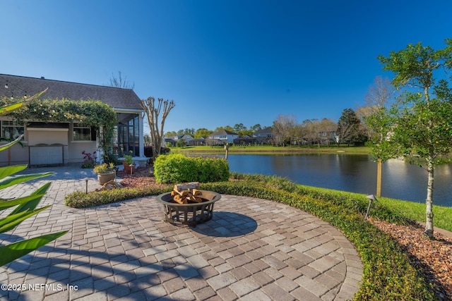 view of patio / terrace with a water view