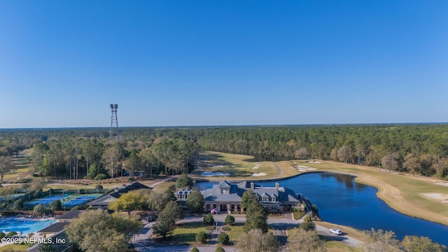 bird's eye view featuring golf course view, a view of trees, and a water view