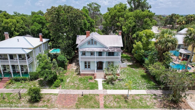 417 N 3rd St, Palatka, FL 32177 - aerial view of property and surrounding area with a pool area