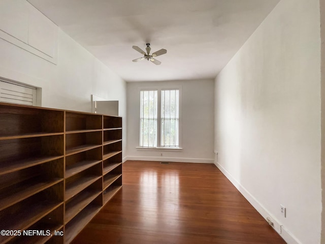 417 N 3rd St, Palatka, FL 32177 - unfurnished living room featuring ceiling fan, baseboards, and wood finished floors