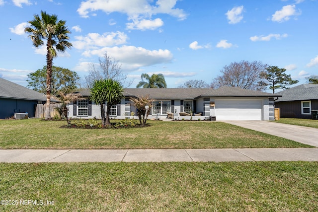 ranch-style house featuring a front yard, central air condition unit, a garage, and driveway